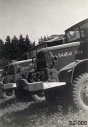 [Line of Trucks of the 995th Field Artillery Bn]