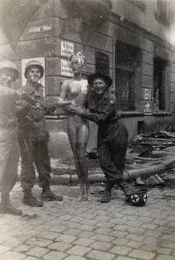 [65th Infantry GIs with Mannequin in Passau, Germany, WW2, 1945]