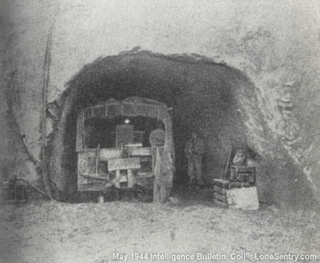 [Figure 19.--German Dugout in the Side of a Cliff (used for storing supplies)]