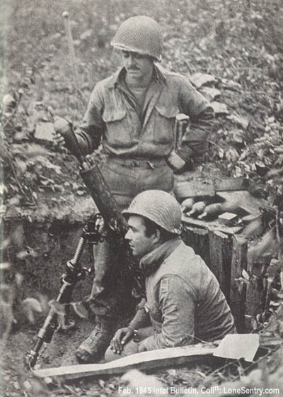 [American soldiers on the Western Front firing French shells from a German mortar.]