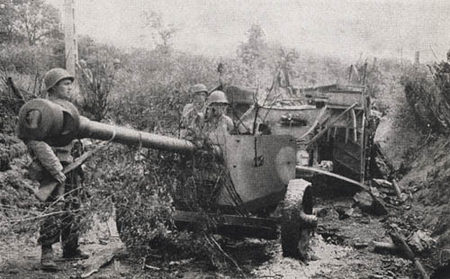 WW2 Soldiers of the 9th Infantry Division with Captured German Antitank Gun