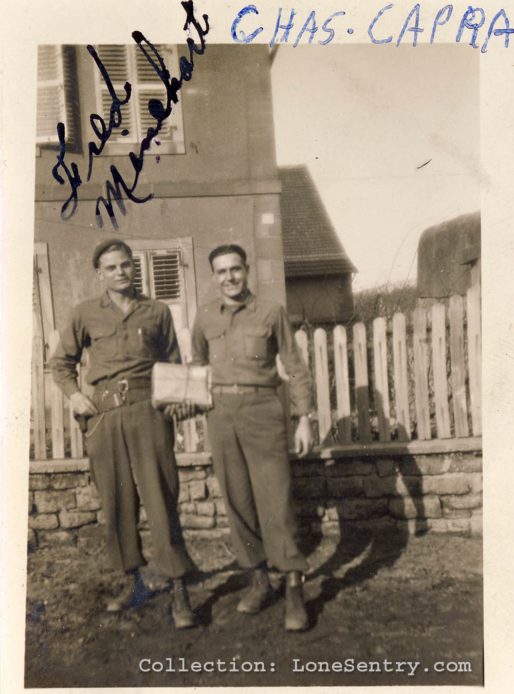 Soldiers of the 995th Field Artillery Battalion in Alsace, February 1945: Charles Capra and Fred Minehart. (Collection LoneSentry.com)