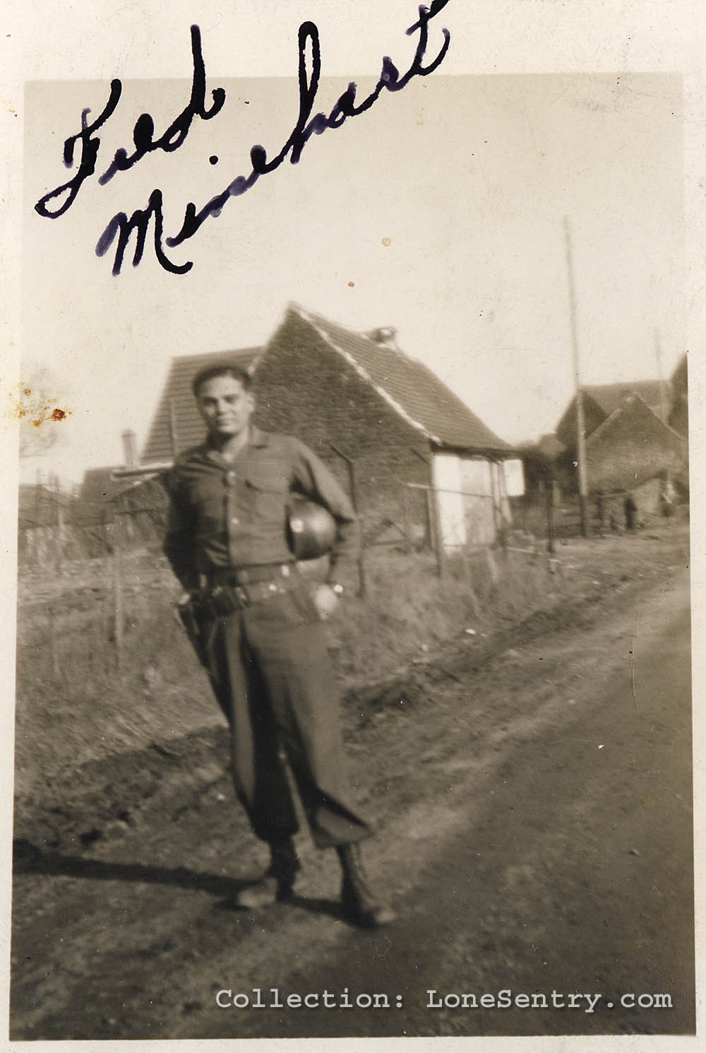 Photograph of Fred Minehart of the 995th Field Artillery Battalion taken in Alsace in February 1945. (Collection LoneSentry.com)