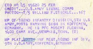 [Caption: MP OF 102ND INFANTRY DIVISION, 9TH U.S. ARMY, POSTS WARNING SIGN IN KOFFEREN, GERMANY. HE IS PFC ROBERT FLEMING, 1400 CARR AVE., MEMPHIS, TENN. (B)]