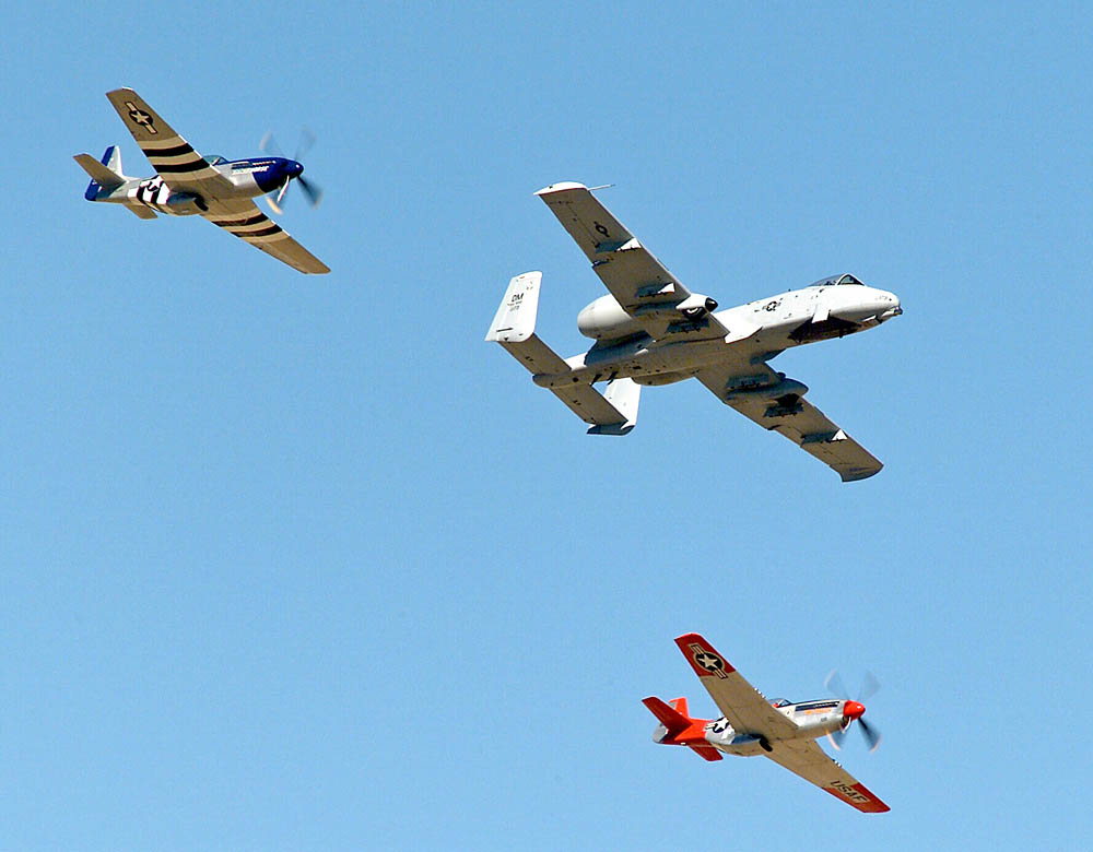 P-51 Mustangs in Formation with A-10 Thunderbolt II