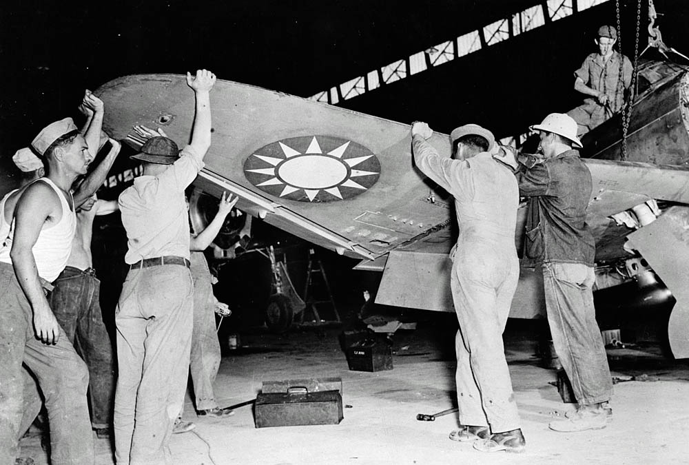 A Republic P-43 Lancer is assembled by ground crew for the Republic of China Air Force, 1943. (U.S. Library of Congress Photograph.)