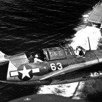 A Curtiss SB2C Helldiver turns over the USS Yorktown, July 1944. (U.S. Navy Photograph.)