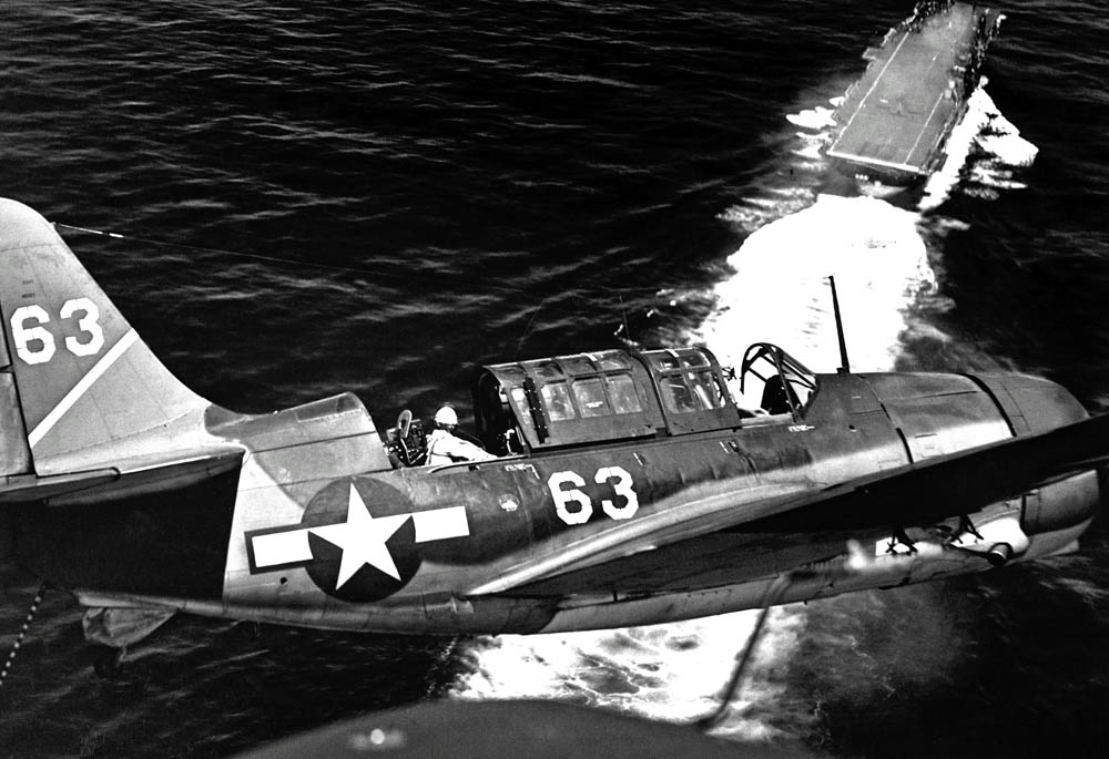 A Curtiss SB2C Helldiver turns over the USS Yorktown, July 1944. (U.S. Navy Photograph.)