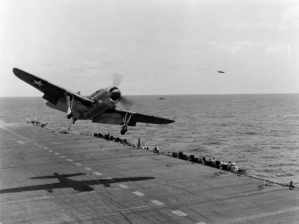 A U.S. Navy Curtiss SB2C-1 Helldiver of Bombing Squadron 17 (VB-17) during flight operations on the aircraft carrier USS Bunker Hill (CV-17) in 1943. (U.S. Navy Photograph.)