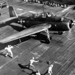 The aircraft carrier USS Bunker Hill (CV-17) prepares to launch a U.S. Navy Grumman TBF Avenger of Torpedo Squadron VT-8 for an attack on the island of Saipan, June 1944. (U.S. Navy Photograph.)