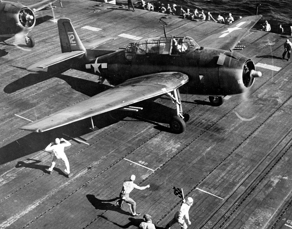 The aircraft carrier USS Bunker Hill (CV-17) prepares to launch a U.S. Navy Grumman TBF Avenger of Torpedo Squadron VT-8 for an attack on the island of Saipan, June 1944. (U.S. Navy Photograph.)