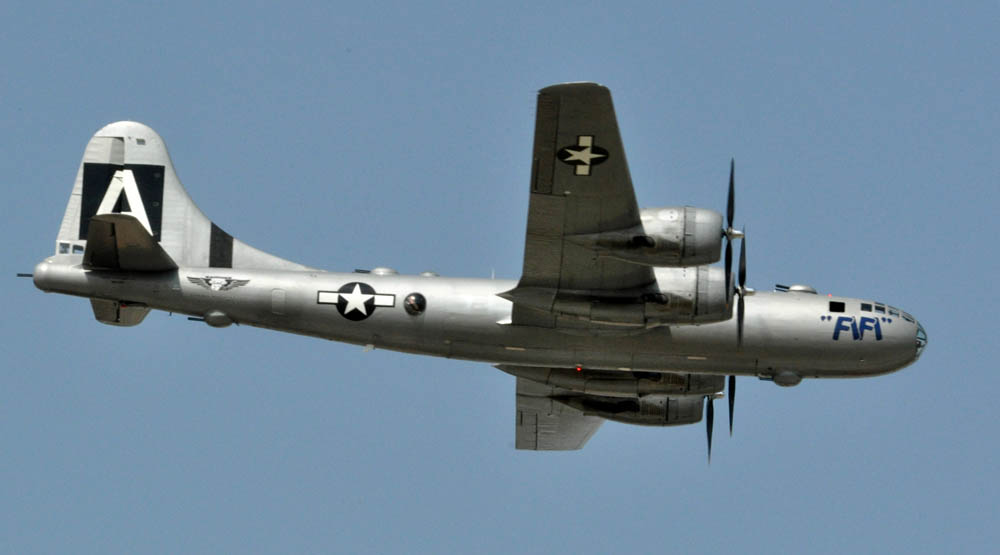 A World War II-era B-29 Superfortress bomber passes over Air Expo 2011, April 17, at Naval Air Station Fort Worth Joint Reserve Base, Texas. Airmen with the 11th Bombardment Group flew planes like "FiFi" during the end of WWII. (U.S. Air Force Photograph / Lt. Col. David Kurle.)