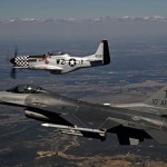 An F-16C Fighting Falcon, 457th Fighter Squadron, flies in formation with a P-51 Mustang over Naval Air Station Fort Worth Joint Reserve Base, Texas, Oct. 3, 2014.