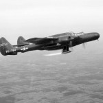 In-flight testing of a ramjet mounted on a Northrop P-61 Black Widow at the Aircraft Engine Research Laboratory (AERL) of NACA. (NASA Photograph.)