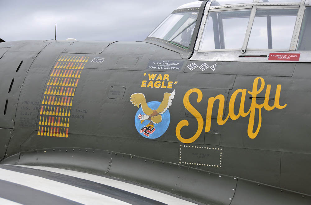 A P-47 Thunderbolt on the flight line at Davis-Monthan Air Force Base, Ariz., during the Heritage Flight Training Course (HFTC) March 1, 2014. Additional aircraft participating in the HFTC were the P-51 Mustang, the P-40 Warhawk, the P-38 Lightning, and the F-86 Sabre. Air Combat Command aircraft include the F-22 Raptor, A-10 Thunderbolt II and the F-16C Fighting Falcon.