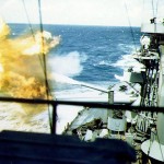 The USS Colorado (BB-45) fires the battleship's main guns, circa November 1943.