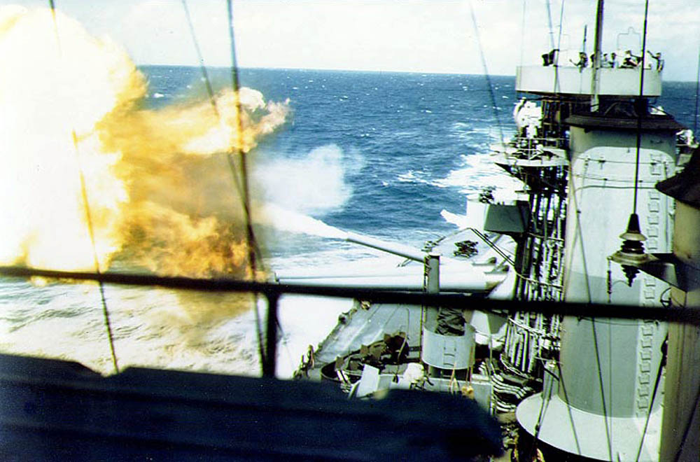 The USS Colorado (BB-45) fires the battleship's main guns, circa November 1943.