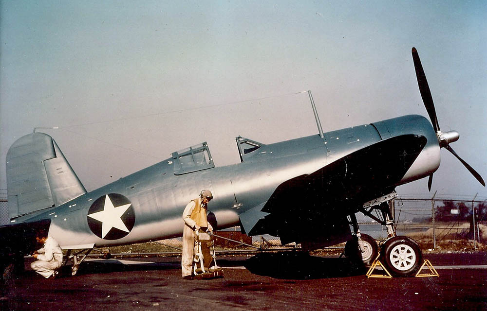 A U.S. Navy Vought F4U-1 Corsair photographed with a test pilot at the Vought factory in Stratford, Connecticut. (U.S. Navy Photograph.)