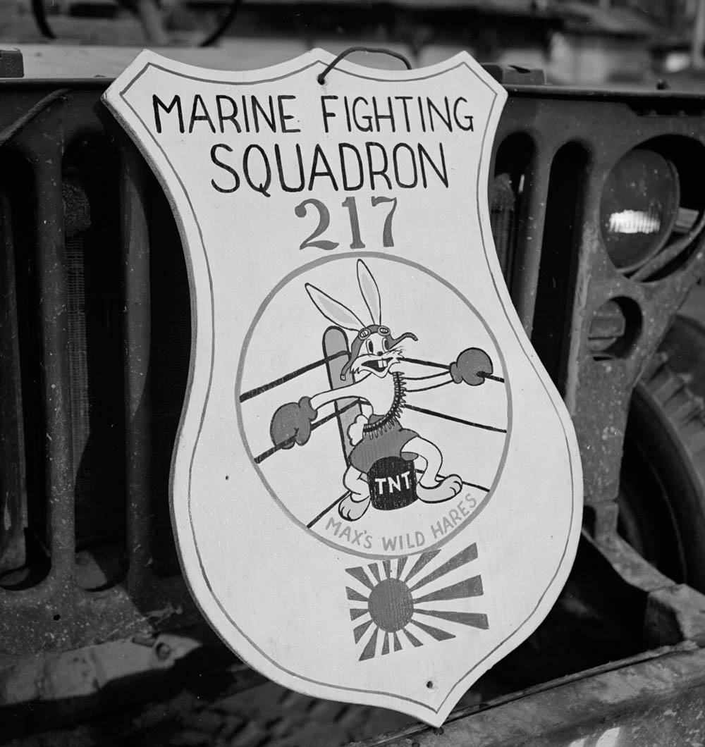 Insignia of U.S. Marine Fighting Squadron 217 (VMF-217) photographed on the front of a jeep on Bougainville, 1944. (U.S. National Archives Photograph.)