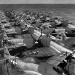 U.S. Army Air Force Republic P-47N Thunderbolts loaded on the flight deck of the escort carrier USS Casablanca (CVE-55) in July 1945. (U.S. National Archives Photograph.)
