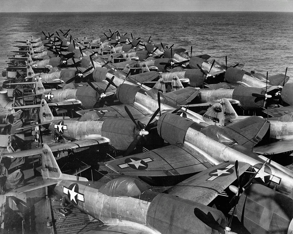 U.S. Army Air Force Republic P-47N Thunderbolts loaded on the flight deck of the escort carrier USS Casablanca (CVE-55) in July 1945. (U.S. National Archives Photograph.)