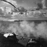 Japanese aircraft attack the USS Kitkun Bay near the Mariana Islands during WWII operations in the Pacific, June 1944. (U.S. Navy Photograph, National Archives.)