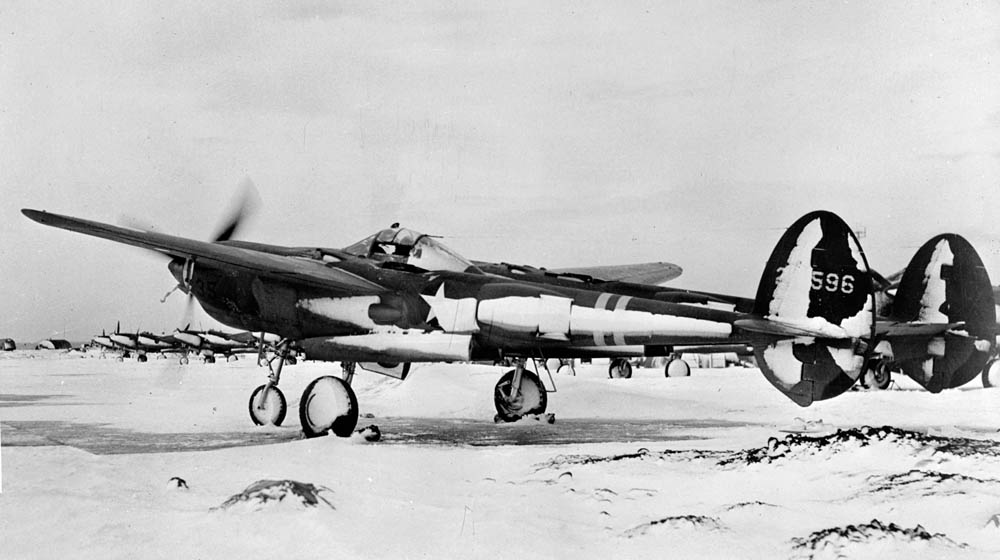 A Lockheed P-38F Lightning of the 50th Fighter Squadron, 14th Fighter Group in the snow at Camp Tripoli airfield, Iceland, November 1942. (U.S. Library of Congress Photograph.)