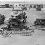 A 37mm M3 anti-tank gun and Dodge WC-4 of the 811th Tank Destroyer Battalion at inspection at Camp Carson, May 1943. (U.S. Army Photograph.)
