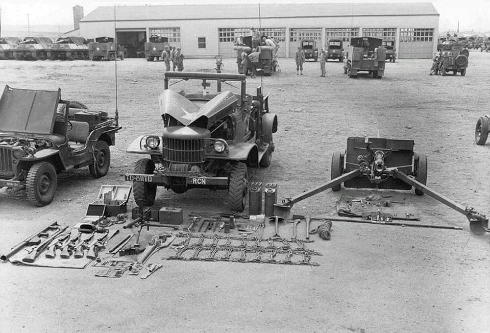 A 37mm M3 anti-tank gun and Dodge WC-4 of the 811th Tank Destroyer Battalion at inspection at Camp Carson, May 1943. (U.S. Army Photograph.)