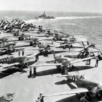 Royal Navy aircraft carrier HMS Implacable with Avengers and Seafires on the flight deck, 1945. (Australian War Memorial Photograph.)