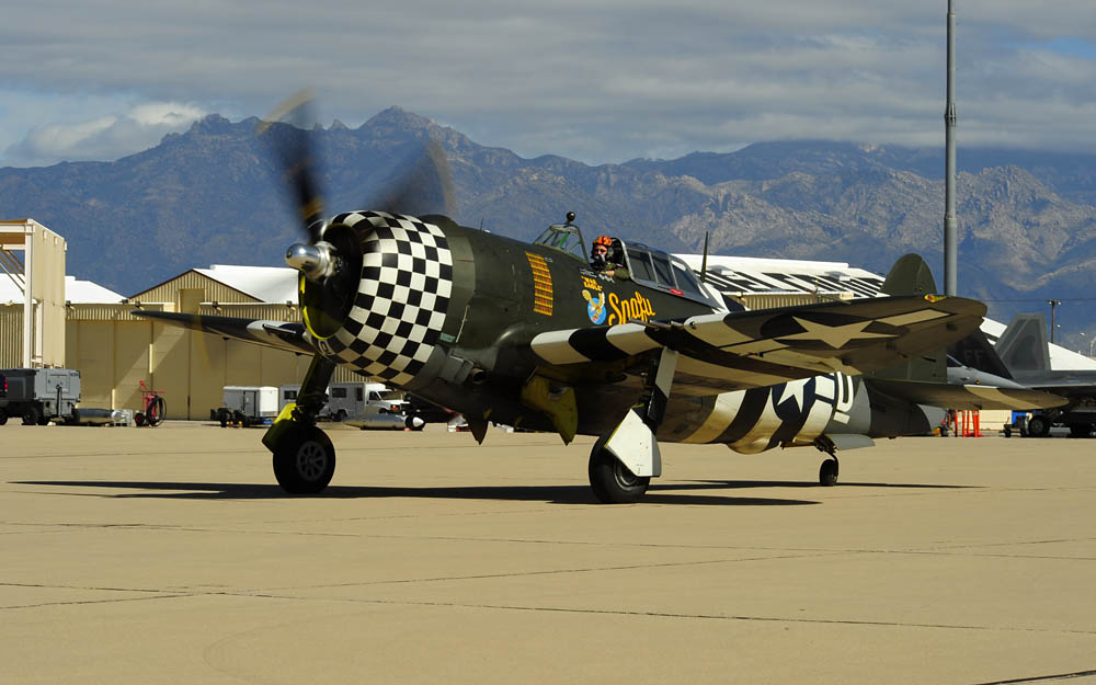 Original Caption: An P-47 Thunderbolt taxis to the runway during the 2015 Heritage Flight Training and Certification Course at Davis-Monthan Air Force Base, Arizona, March 1, 2015.