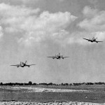 A group of North American P-51 Mustang fighters from the 332nd Fighter Group take off from an airfield in Italy to escort heavy bombers. (U.S. Air Force Photograph.)