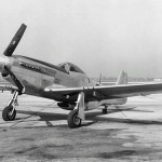 The aerodynamic lines of the P-51 Mustang are shown in this photograph of a parked P-51D aircraft. (U.S. Air Force Photograph.)