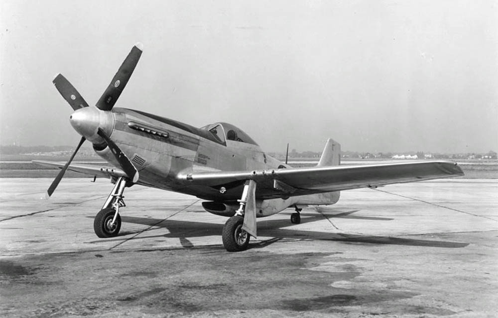 The aerodynamic lines of the P-51 Mustang are shown in this photograph of a parked P-51D aircraft. (U.S. Air Force Photograph.)