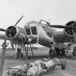 Ordnance is loaded on an RAF Bristol Blenheim Mark IV of No. 40 Squadron at Wyton, Cambridgeshire. (Imperial War Museum Photograph.)