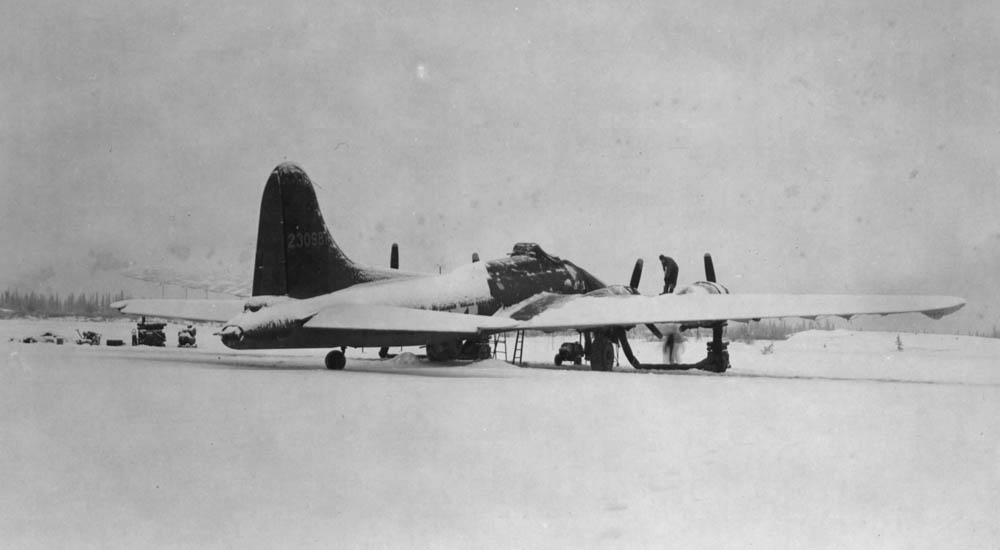 A Boeing B-17 Flying Fortress covered in snow at Ladd Field, Alaska. (U.S. Air Force Photograph.)
