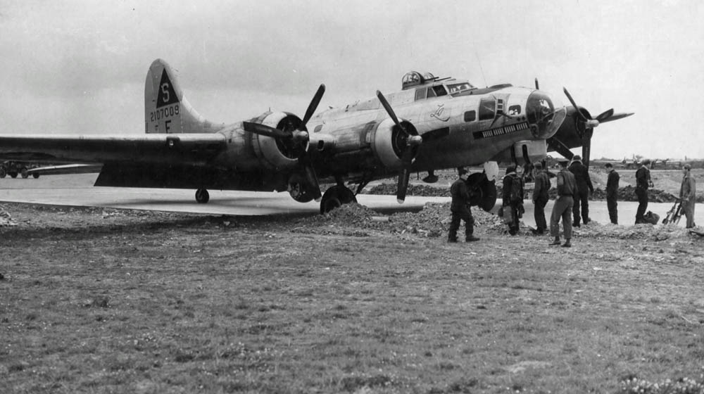 The B-17 Flying Fortress "Lady Jane" from the 613th BS, 401st BG is stuck at the edge of the runway, July 1944. (U.S. Air Force Photograph.)