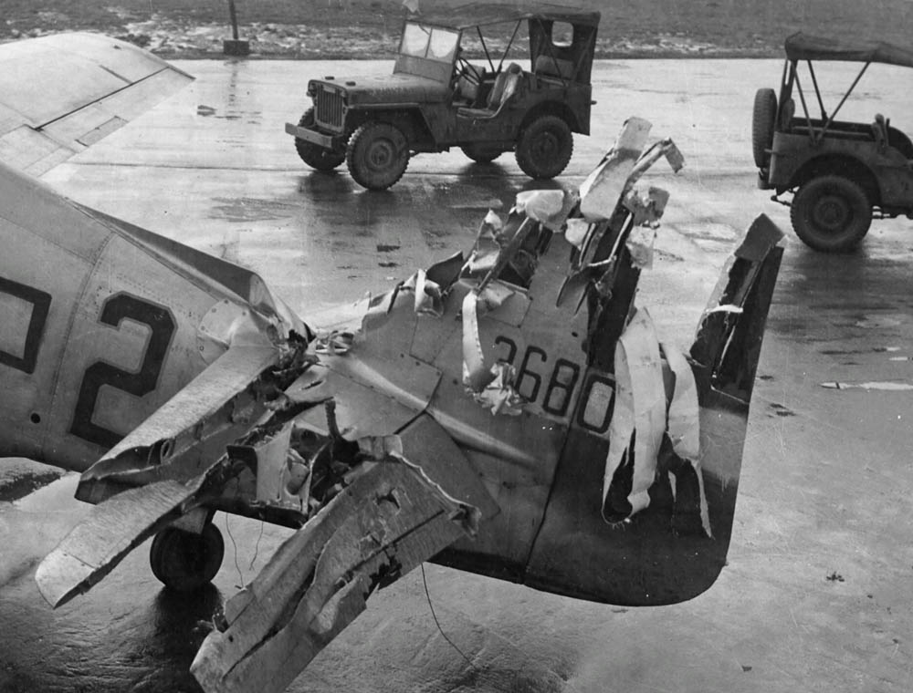A damaged tail on a P-51 Mustang of the 353rd Fighter Group, January 1945. (U.S. Air Force Photograph.)