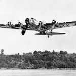 Early-model Boeing B-17B Flying Fortress shows its aerodynamic lines during takeoff. (U.S. Air Force Photograph.)
