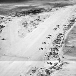 Aerial photograph of Hawkins Field on Betio Island, Tarawa Atoll, Gilbert Islands in March 1944 with a variety of aircraft visible. (U.S. Navy Photograph.)