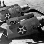 A pair of Grumman F4F-4 Wildcat fighters from Fighting Squadron VF-6 on the elevator of the aircraft carrier USS Enterprise (CV-6) during the Doolittle Raid, April 1942. (U.S. Navy Photograph.)