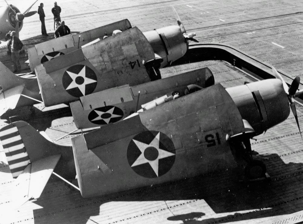 A pair of Grumman F4F-4 Wildcat fighters from Fighting Squadron VF-6 on the elevator of the aircraft carrier USS Enterprise (CV-6) during the Doolittle Raid, April 1942. (U.S. Navy Photograph.)