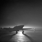 A Hawker Hurricane Mark I night fighter prepares for a night takeoff at Debden, Essex to intercept German raiders, March 1941. (Imperial War Museum Photograph.)