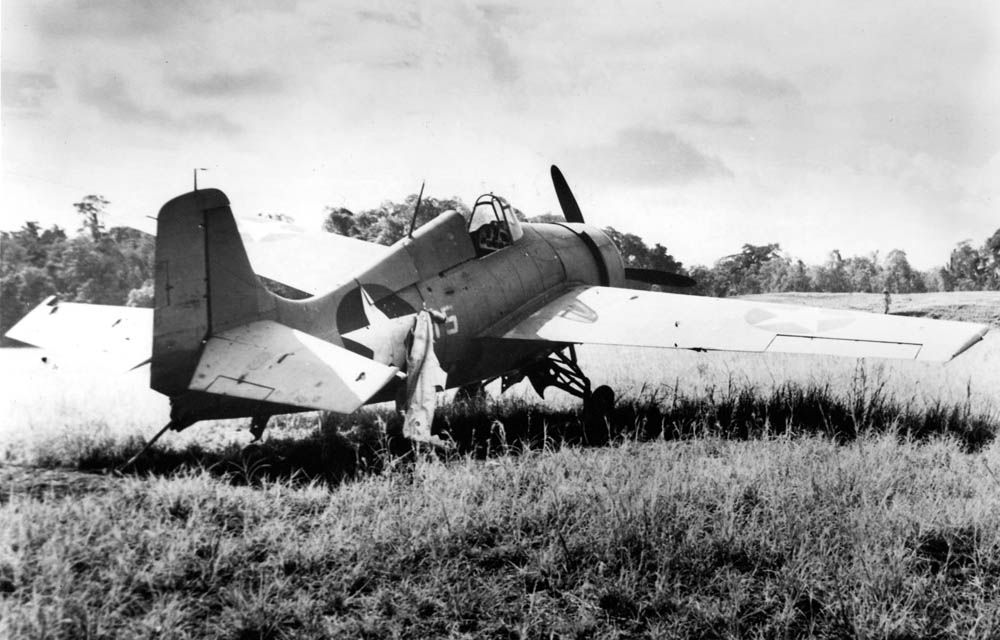 A Grumman F4F-4 Wildcat damaged near Henderson Field on Guadalcanal. (U.S. Navy Photograph.)