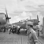 Douglas SBD-5 Dauntless dive bombers of bombing squadron VB-12 on the flight deck of the U.S. Navy aircraft carrier USS Saratoga (CV-3), October 1943. (U.S. Navy Photograph, U.S. National Archives and Records Administration.)