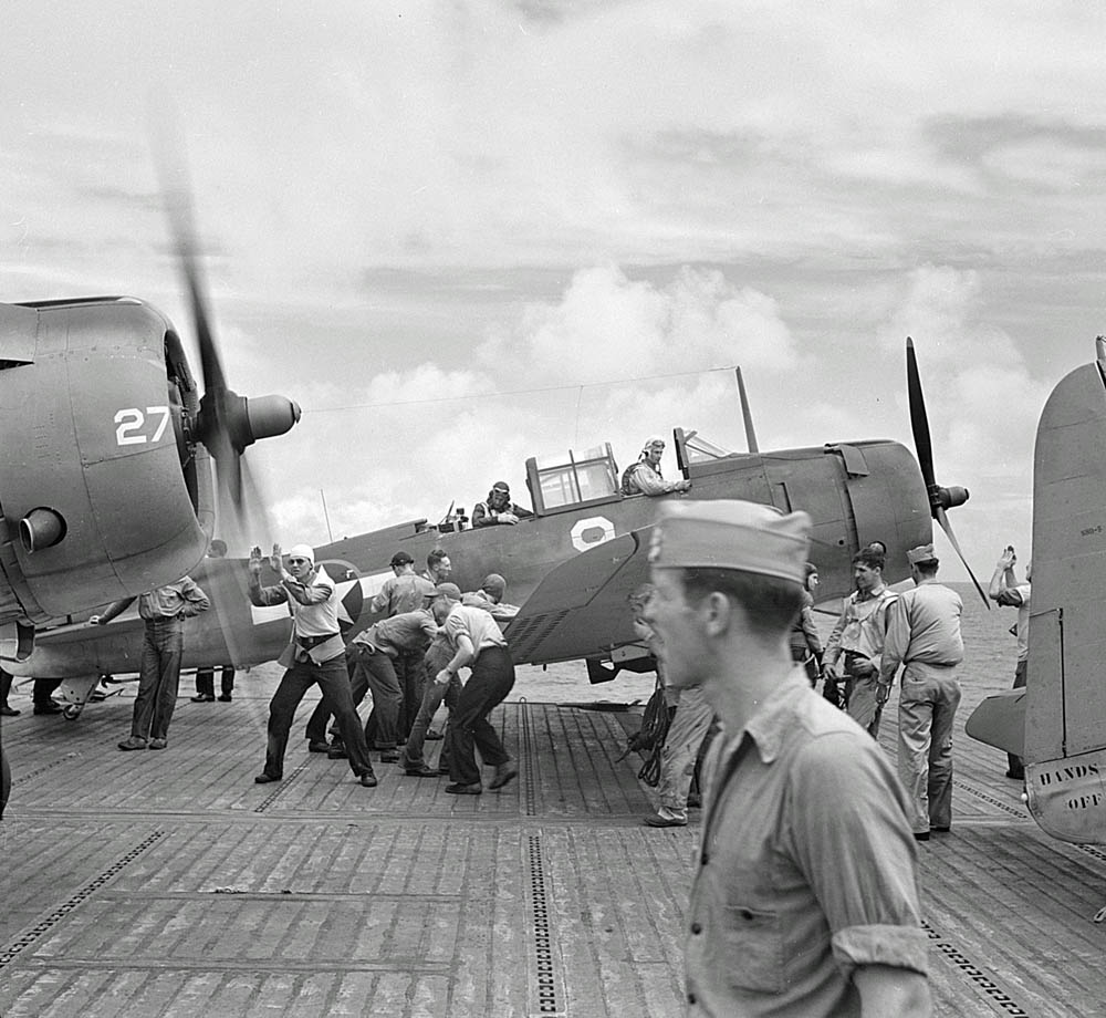 Douglas SBD-5 Dauntless dive bombers of bombing squadron VB-12 on the flight deck of the U.S. Navy aircraft carrier USS Saratoga (CV-3), October 1943. (U.S. Navy Photograph, U.S. National Archives and Records Administration.)