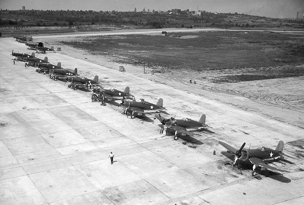 Newly manufacturer Goodyear FG-1A Corsair fighters await delivery at the Goodyear Aerospace Corporation in Akron, Ohio. (U.S. Navy Photograph.)