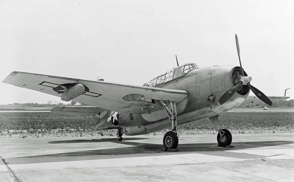 The clean lines of a TBM-1C Avenger with wing-mounted radar pod are shown to good effect at NATC Patuxent River, Maryland, July 1944. (U.S. Navy Photograph.)