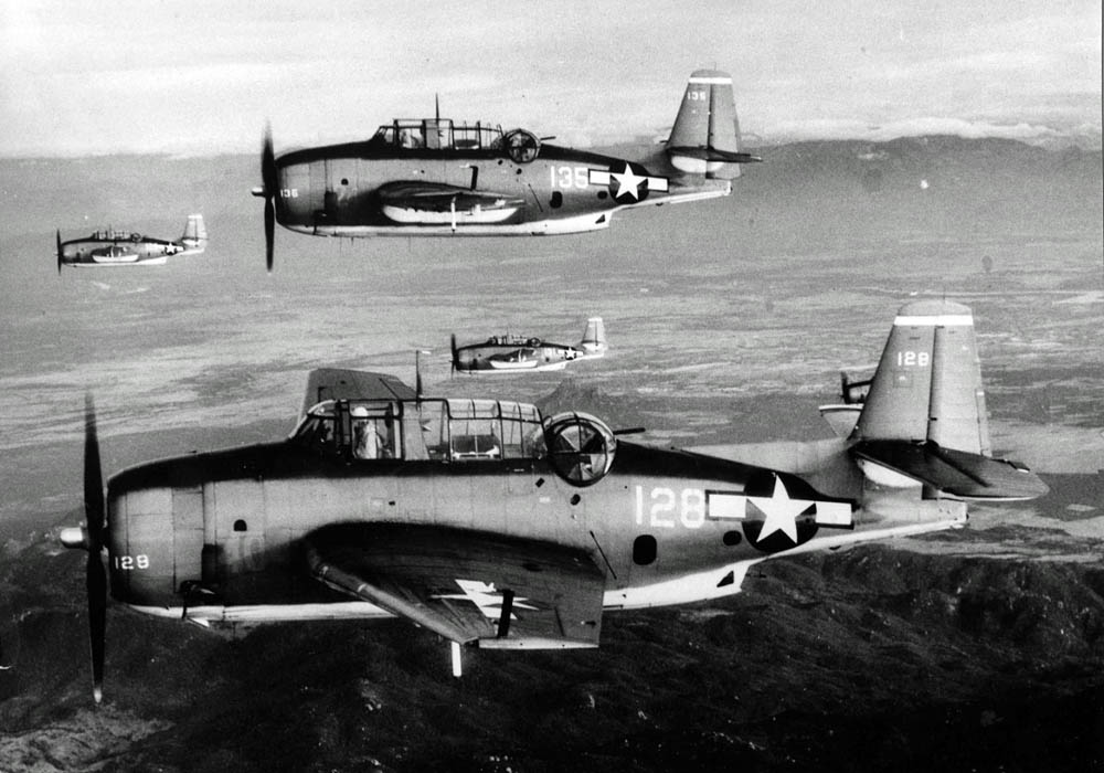TBM Avengers -- of VT-4 USS Essex (CV-9) -- fly in formation, January 1945. (U.S. National Archives Photograph.)