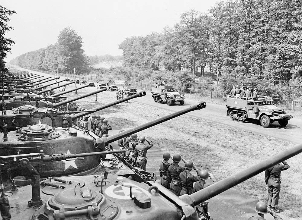 The U.S. Army's 2nd Armored Division is reviewed by U.S. Secretary of War Henry Stimson in Berlin, Germany during the Potsdam Conference, July 1945. (U.S. National Archives Photograph.)